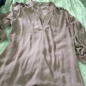 Super cute blouse with cutouts  on the shoulders